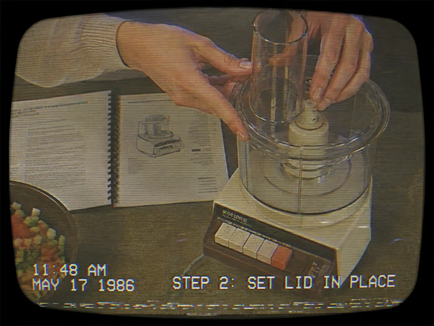 A demonstration close-up, the same broadcast treatment carried onto hands and a countertop.