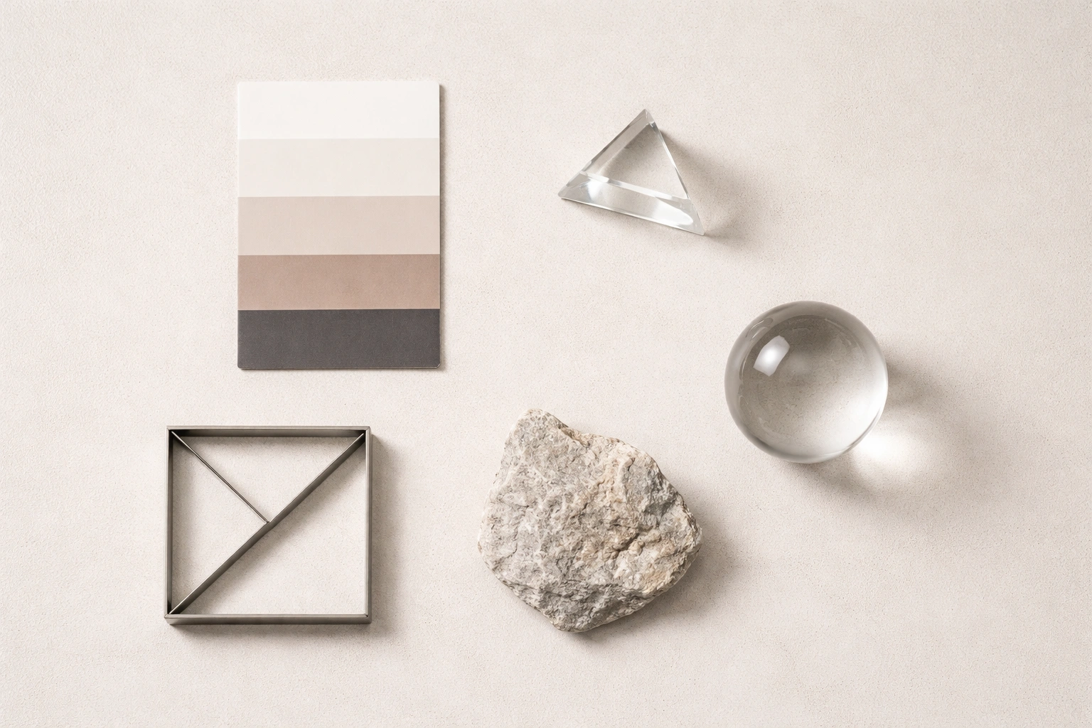 Five objects representing the visual dimensions required for consistent ai art direction: color, lighting, composition, texture, and mood