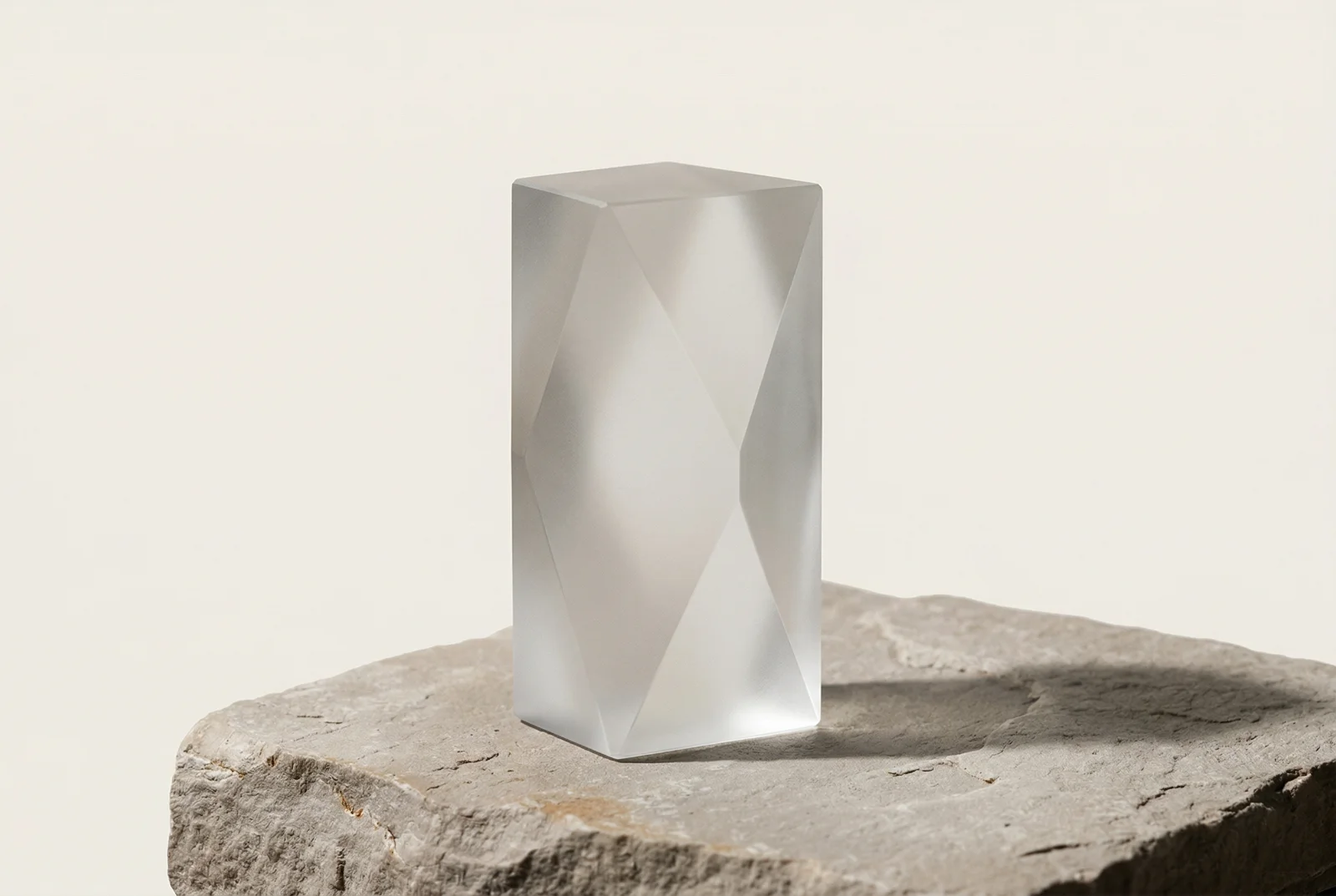 A patina-finish metal slab with six recessed channels of varying depth, illustrating the six dimensions of an AI brand voice specification